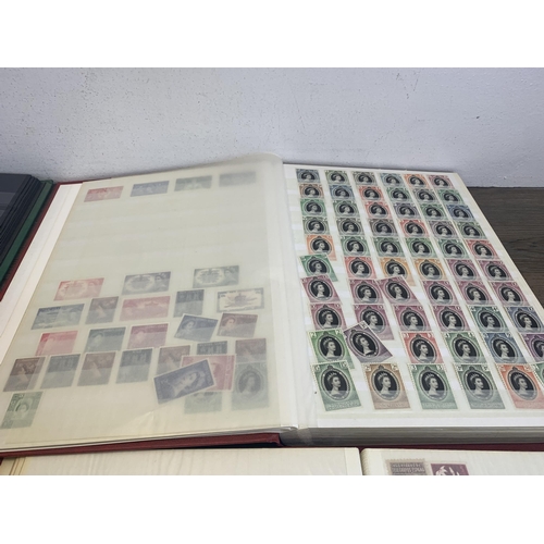 533 - Seven albums containing a collection of worldwide stamps