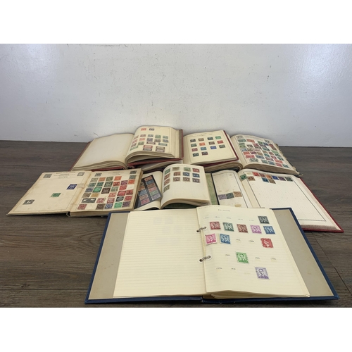 534 - Seven albums containing a collection of worldwide stamps