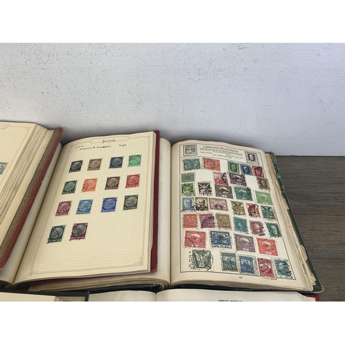 534 - Seven albums containing a collection of worldwide stamps