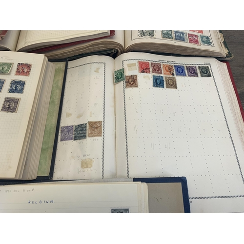 534 - Seven albums containing a collection of worldwide stamps