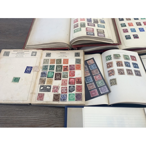 534 - Seven albums containing a collection of worldwide stamps