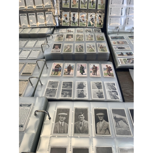 537 - Seven albums containing a large collection of cigarette cards