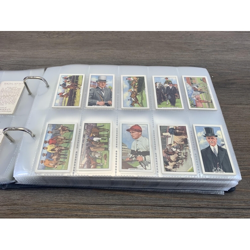 538 - An album containing a large collection of Gallagher Ltd. cigarette cards to include famous footballe... 