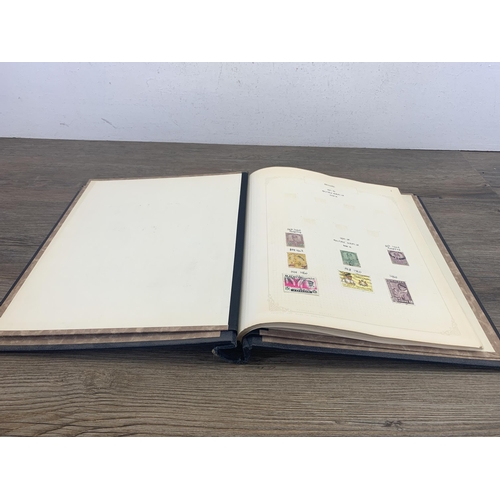 540 - A stamp album containing a collection of worldwide stamps