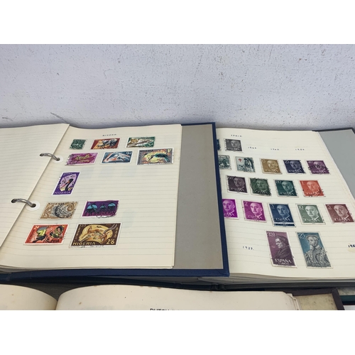 542 - Six albums containing a collection of worldwide stamps