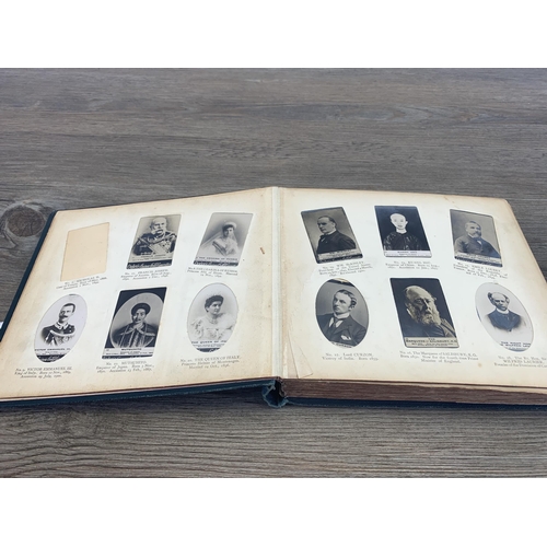 543 - An early 20th century Ogden's New Century photo album with cigarette cards