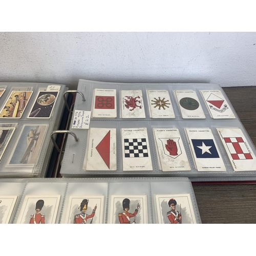 545 - Four albums containing a collection of cigarette cards