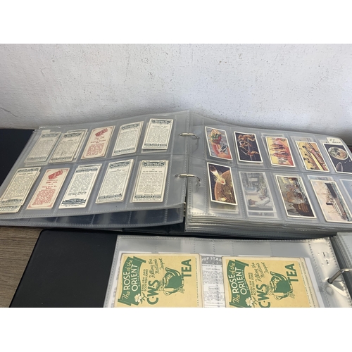 545 - Four albums containing a collection of cigarette cards