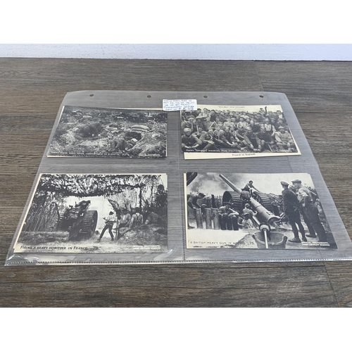 549 - A collection of antique and later postcards to include World War I silk titled Hands Across the Sea,... 