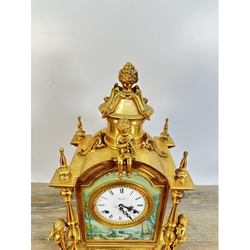 559 - A 19th century style Kienzle gilt metal chiming mantel clock - approx. 45cm high x 24cm wide x 19cm ... 