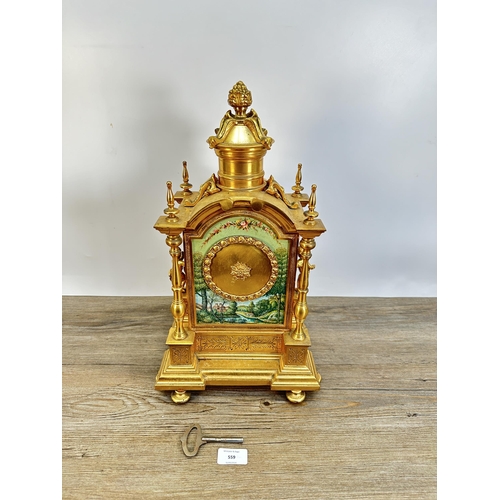 559 - A 19th century style Kienzle gilt metal chiming mantel clock - approx. 45cm high x 24cm wide x 19cm ... 