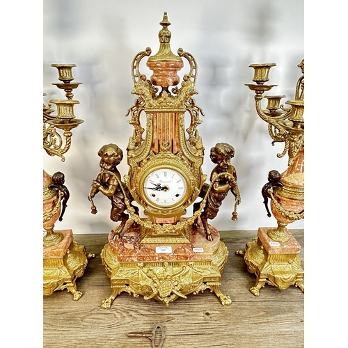 560 - A Rococo style Italian Imperial gilt metal and red marble chiming mantle clock and garniture set - c... 