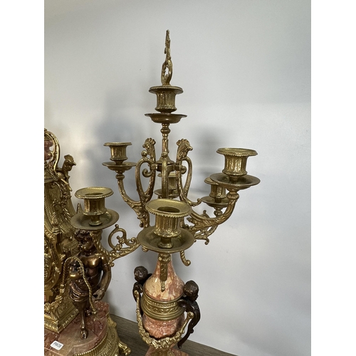 560 - A Rococo style Italian Imperial gilt metal and red marble chiming mantle clock and garniture set - c... 