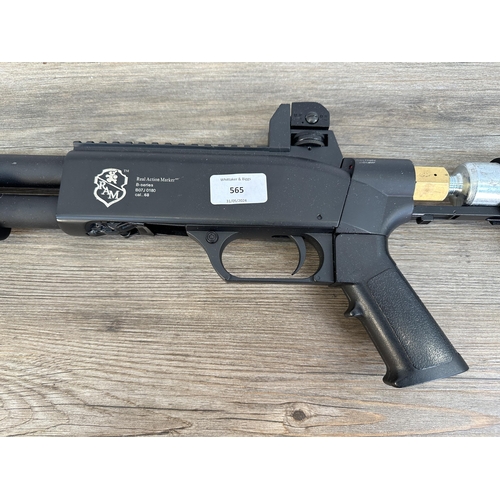 565 - A Real Action Marker B-series B07J0180 cal. 68 co2 powered pump action paint ball shotgun