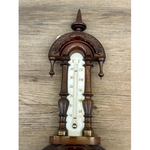 573 - A 19th century carved mahogany aneroid barometer - approx. 60cm high x 23cm wide