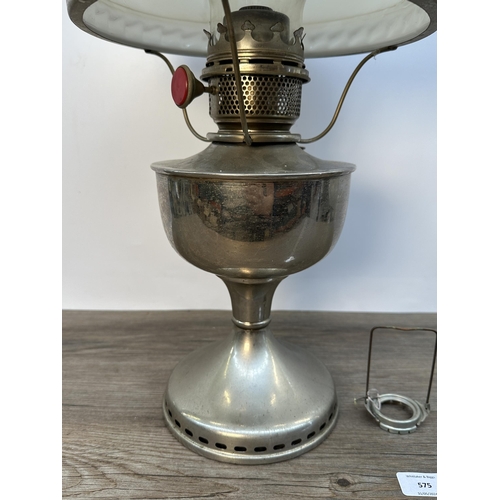 575 - A mid 20th century chrome plated oil lamp with opaline glass shade