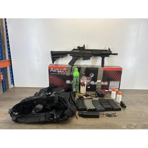 578 - A quantity of airsoft equipment to include boxed King Arms SIG 556 Shorty, SIG Arms magazines, S.W.A... 