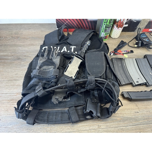 578 - A quantity of airsoft equipment to include boxed King Arms SIG 556 Shorty, SIG Arms magazines, S.W.A... 