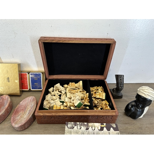 582 - A collection of items to include Indian carved hardwood rectangular box, pair of boxed Iittala Finla... 