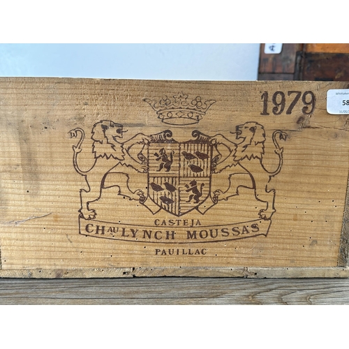 589 - Three items, one T & E Limited four section bottle crate, one 1979 pine wine bottle shipping crate a... 