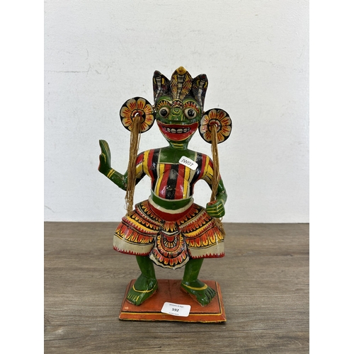 592 - A vintage Mexican carved wooden and hand-painted folk art figurine - approx. 33cm high x 18cm wide