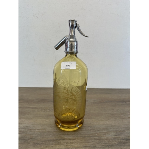 595 - A mid 20th century Schweppes Limited amber glass soda syphon - approx. 31cm high