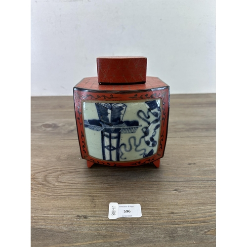 596 - A Chinese red lacquered and hand-painted tea caddy with 19th century blue and white porcelain plaque... 