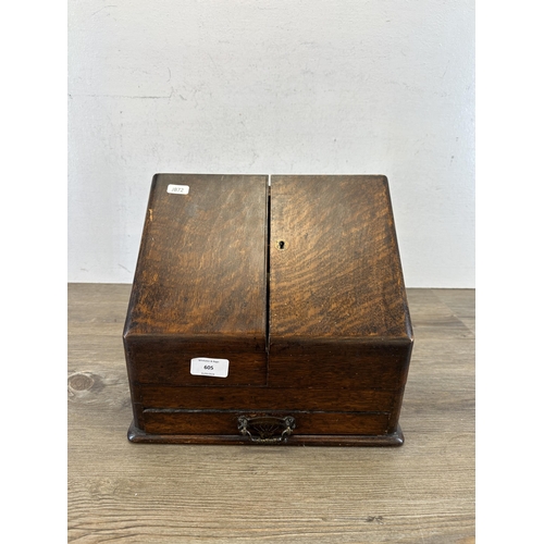 605 - An early 20th century oak stationary cabinet - approx. 27cm high x 29cm wide x 17cm deep