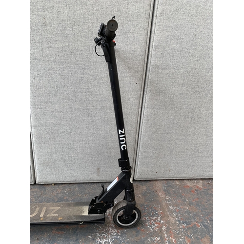 856 - A Zinc electric scooter