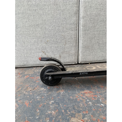 856 - A Zinc electric scooter