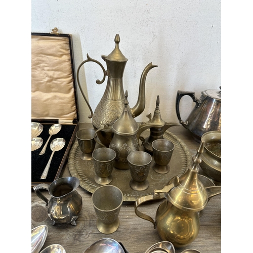 410 - A collection of 19th century and later metalware to include silver plated four piece tea set with or... 