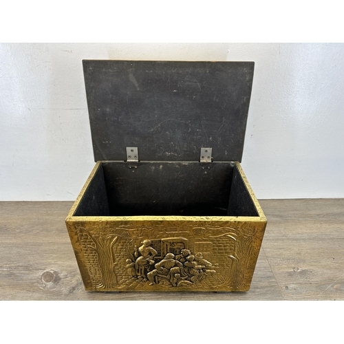 411 - A vintage embossed brass rectangular log bin - approx. 26cm high x 43cm wide x 27cm deep