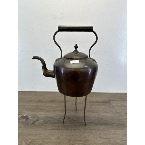 412 - A Victorian oversized copper kettle - approx. 35cm high