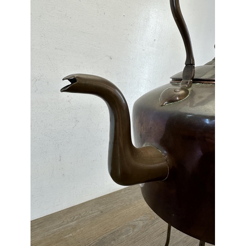 412 - A Victorian oversized copper kettle - approx. 35cm high