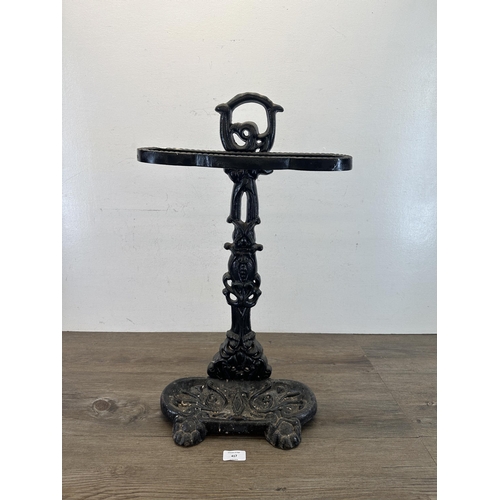 417 - A Victorian style cast iron and black painted stick stand - approx. 60cm high x 35cm wide