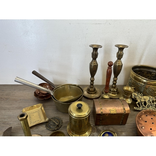 419 - A collection of 19th century and later copper and brassware to include casket shaped rectangular tri... 