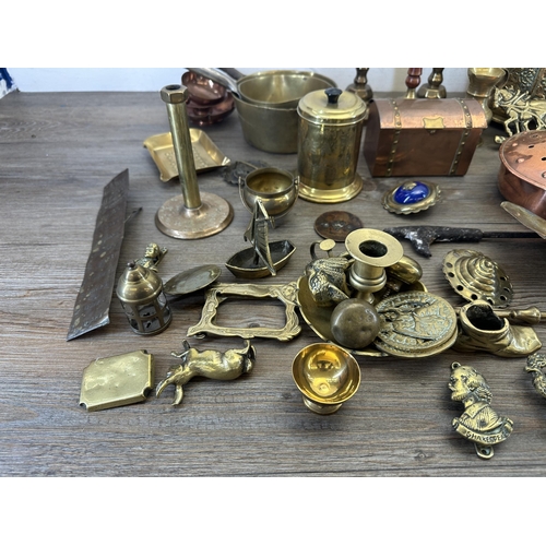 419 - A collection of 19th century and later copper and brassware to include casket shaped rectangular tri... 