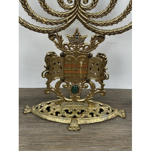 421 - Two cast brass and enamel religious ornaments, one Menorah - approx. 34.5cm high and one Ten Command... 