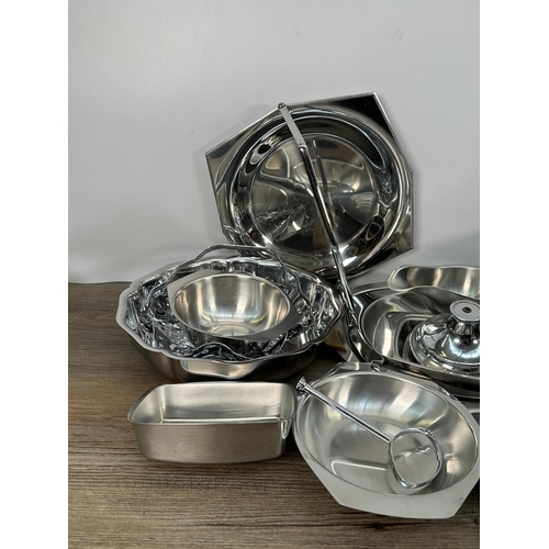 422 - A collection of metalware to include vintage catering equipment, loose cutlery, 1930s oak cased Watf... 