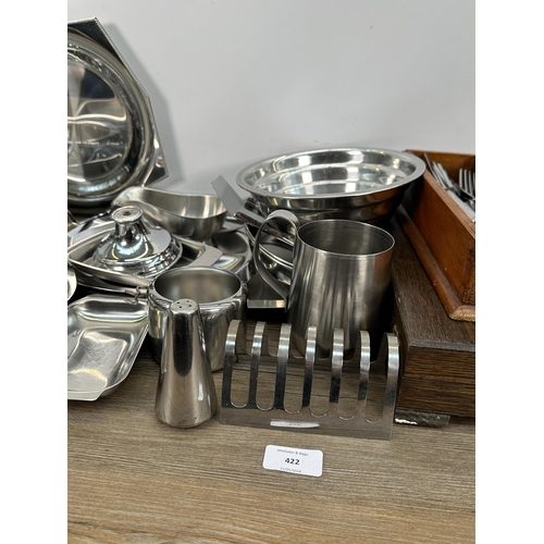 422 - A collection of metalware to include vintage catering equipment, loose cutlery, 1930s oak cased Watf... 