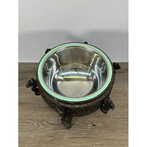 430 - A mid 20th century James Mont style cast metal bronze and verdigris effect ice bucket with Asian ins... 