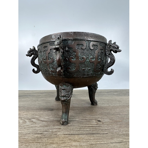 430 - A mid 20th century James Mont style cast metal bronze and verdigris effect ice bucket with Asian ins... 