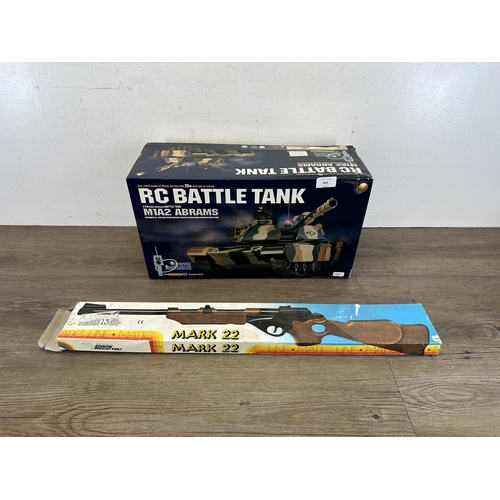 435 - Two boxed toys, one M1A2 Abrams RC Battle Tank and one Italian Edison Giocattoli Mark 22 riffle