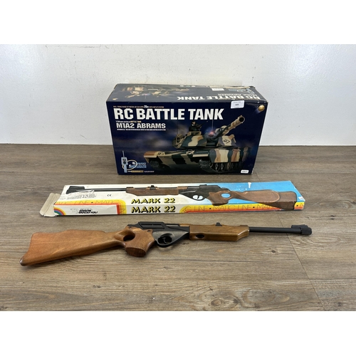 435 - Two boxed toys, one M1A2 Abrams RC Battle Tank and one Italian Edison Giocattoli Mark 22 riffle