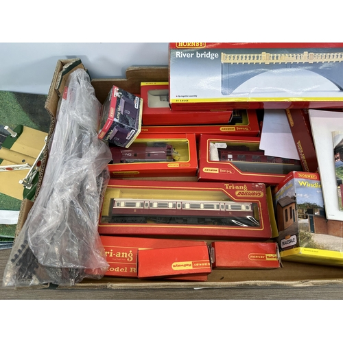 437 - A collection of mostly boxed Hornby model railway accessories to include passenger coaches, river br... 