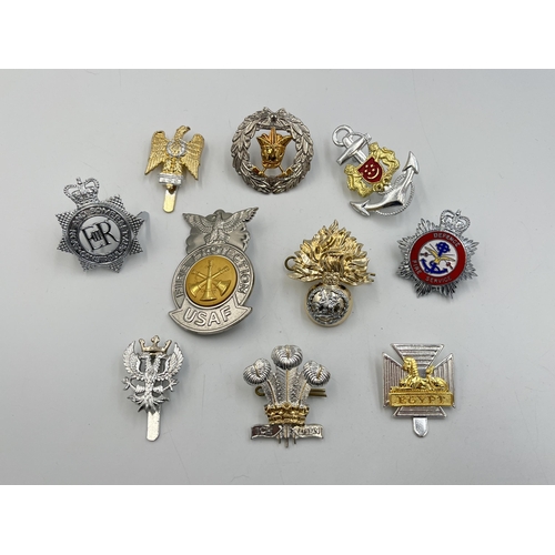 2202 - Ten military cap badges