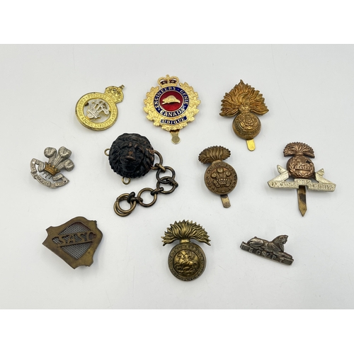 2204 - Ten military cap badges