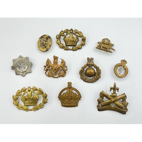 2207 - Ten military cap badges