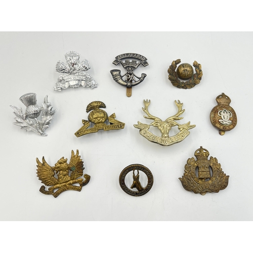 2208 - Ten military cap badges