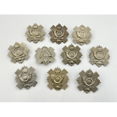 2213 - Ten military cap badges